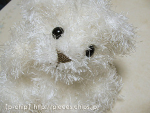 目玉ボタンを付けたクマ